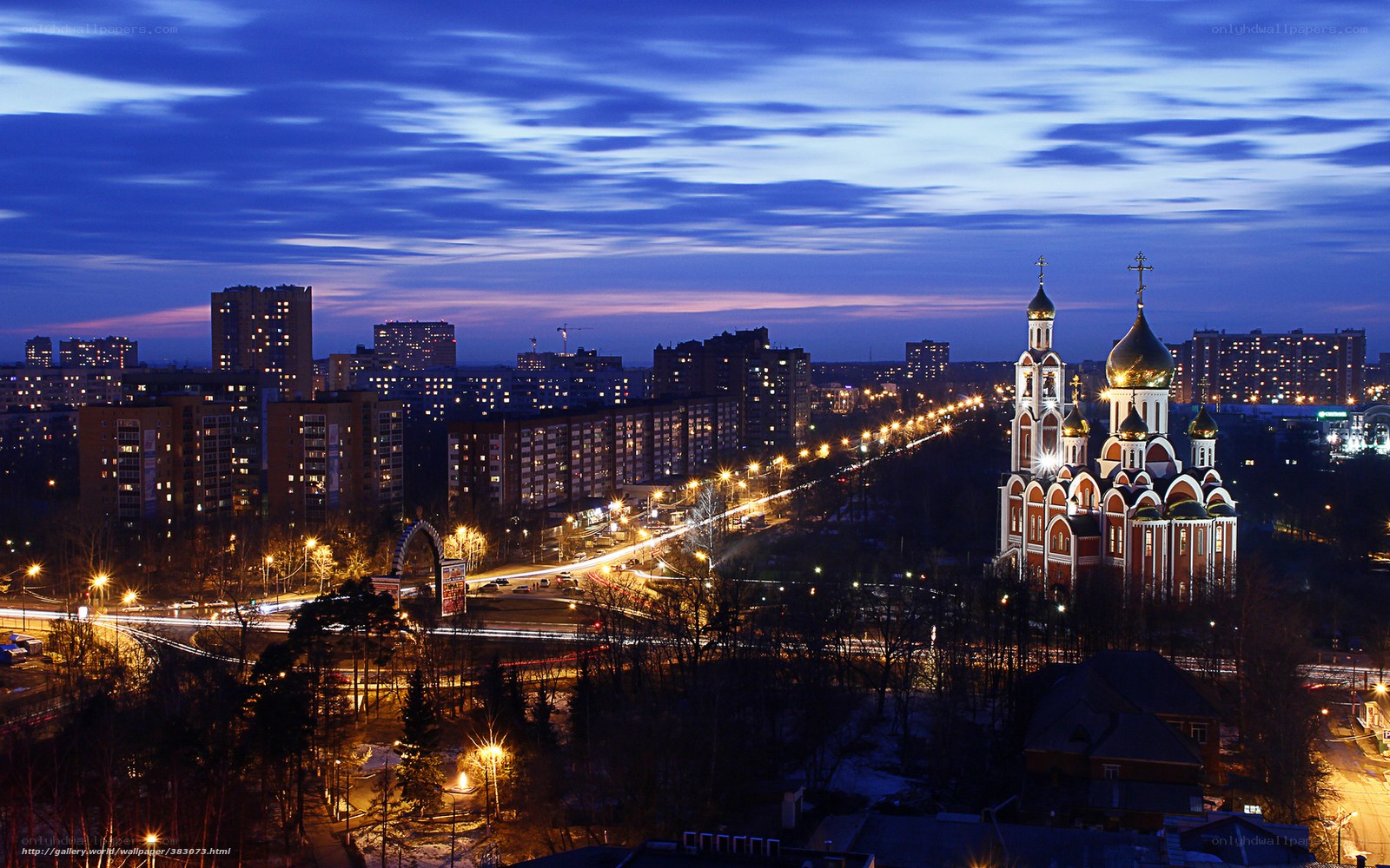 Cityscape at dusk with church