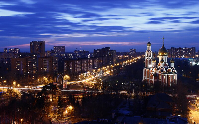 Cityscape at dusk with church