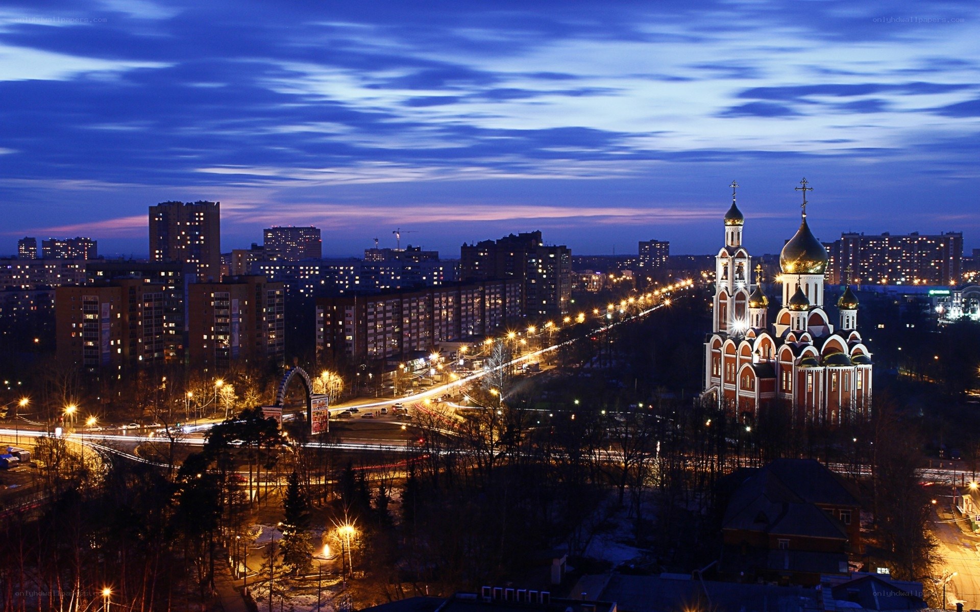 Cityscape at dusk with church