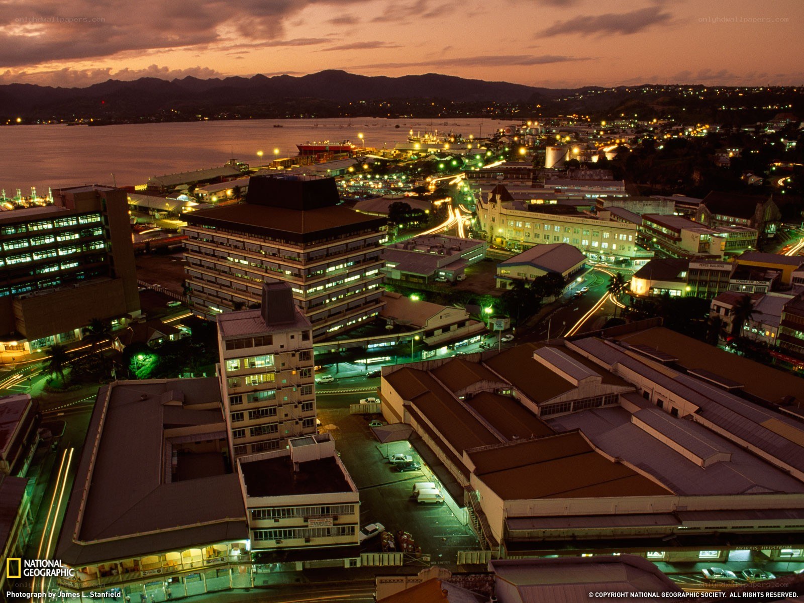 cityscape at dusk with harbor