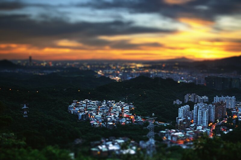 Cityscape at dusk with tilt-shift effect
