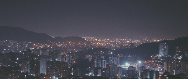Cityscape at Night — Black, Calm, Photograph, Buildings, Hills