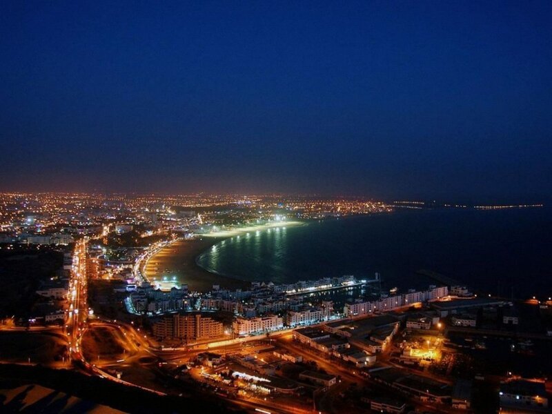 Cityscape at Night — Blue, Calm, Photograph, Beach