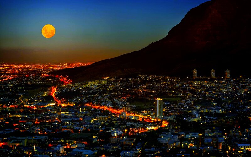 Cityscape at Night — Orange, Dramatic, Photograph, Moon