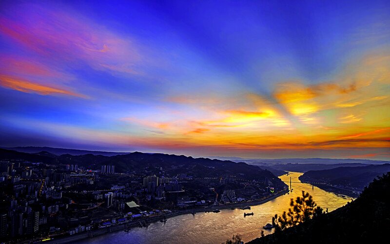 Cityscape at Sunset — Blue, Dramatic, Photograph, River