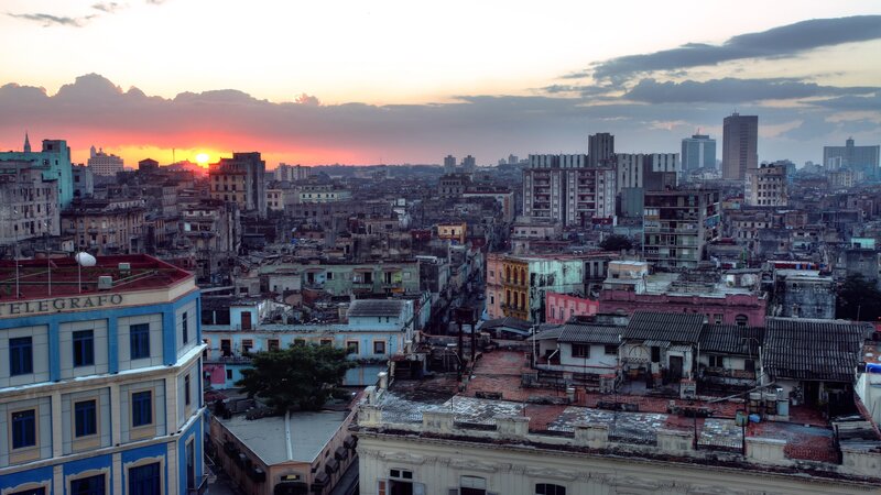 Cityscape at Sunset — Orange, Dramatic, Photograph, Buildings, Sky, Sun