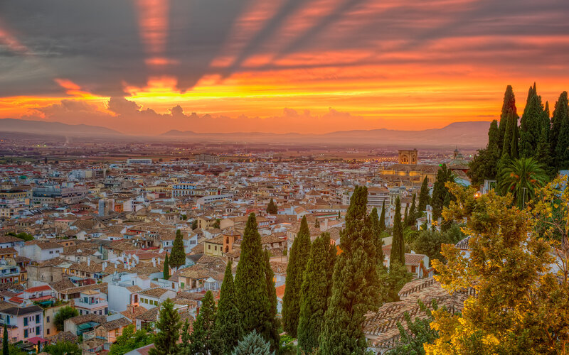 Cityscape at Sunset — Orange, Dramatic, Photograph, Buildings, Trees