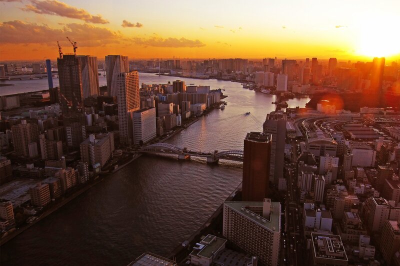 Cityscape at Sunset — Orange, Dramatic, Photograph, River, Skyscrapers