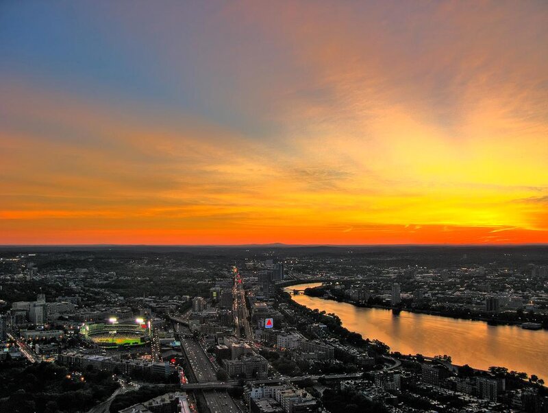 Cityscape at Sunset — Orange, Dramatic, Photograph, River, Stadium