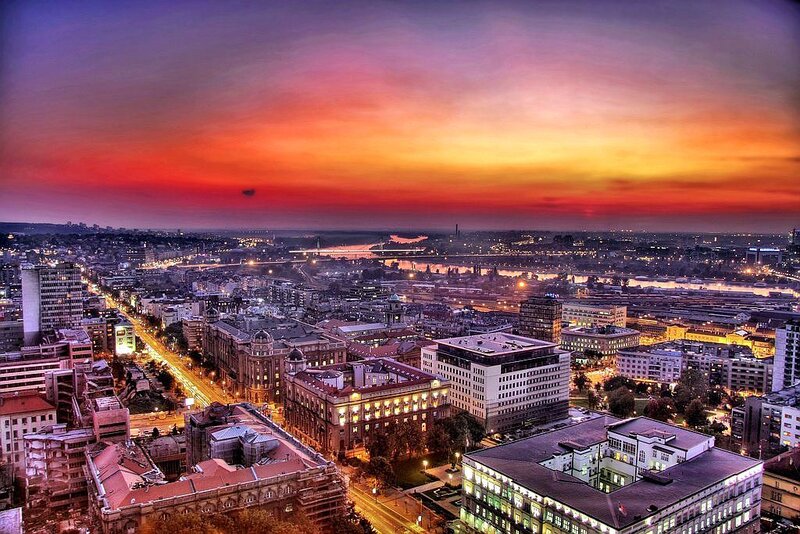 Cityscape at Sunset — Orange, Dramatic, Photograph