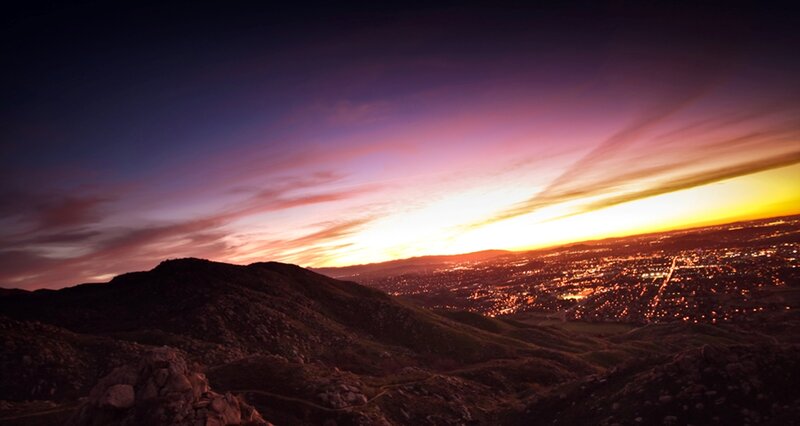 Cityscape at Sunset — Purple, Dramatic, Photograph, Mountains, Sky, Lights