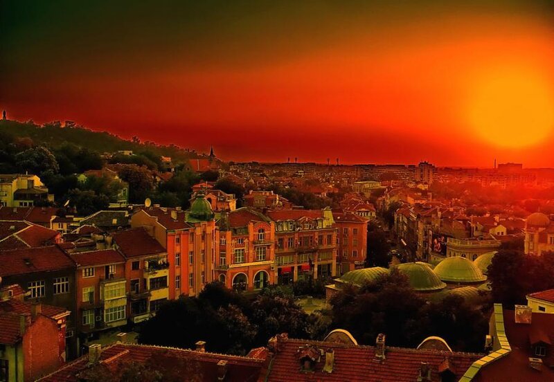 Cityscape at Sunset — Red