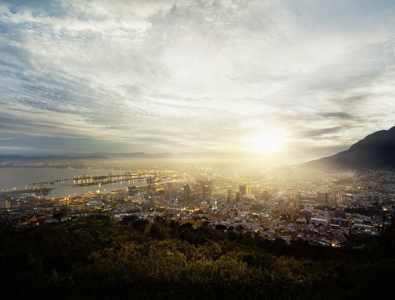 Cityscape at Sunset — Yellow, Dramatic, Photograph, Mountain