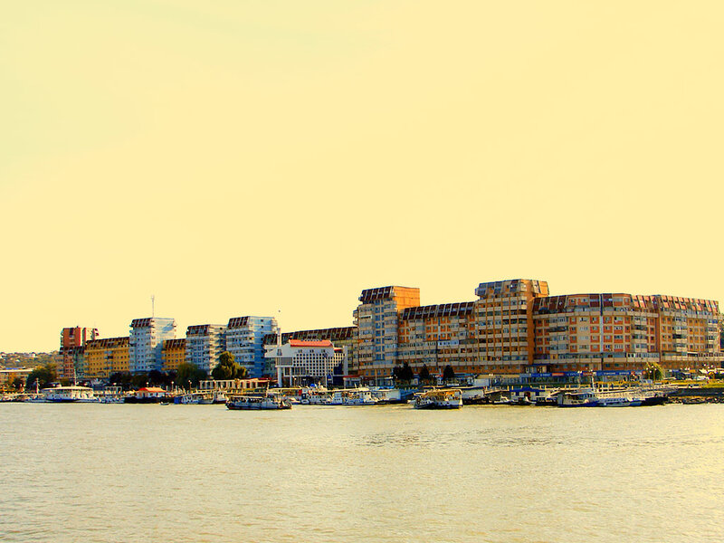 cityscape by the river