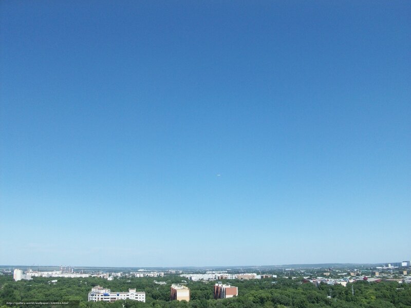 Cityscape under clear blue sky
