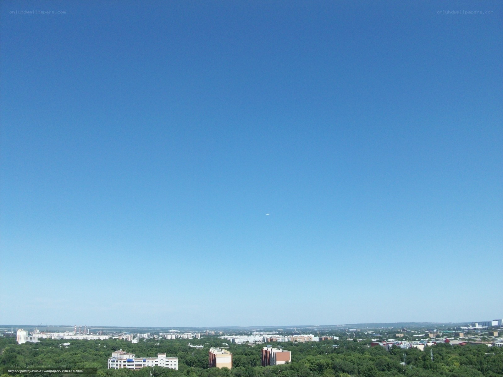 Cityscape under clear blue sky