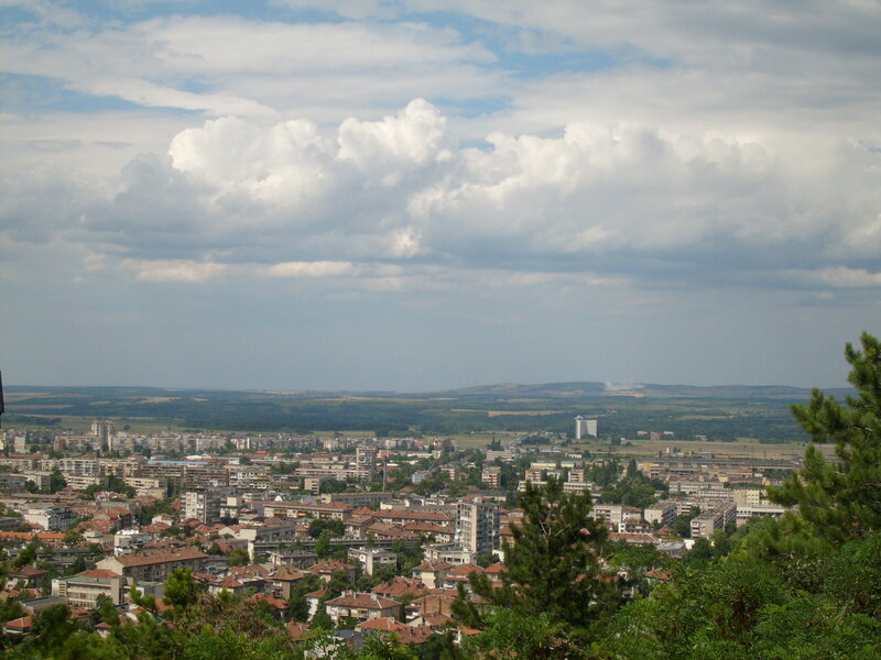 Cityscape under Cloudy Sky — Blue
