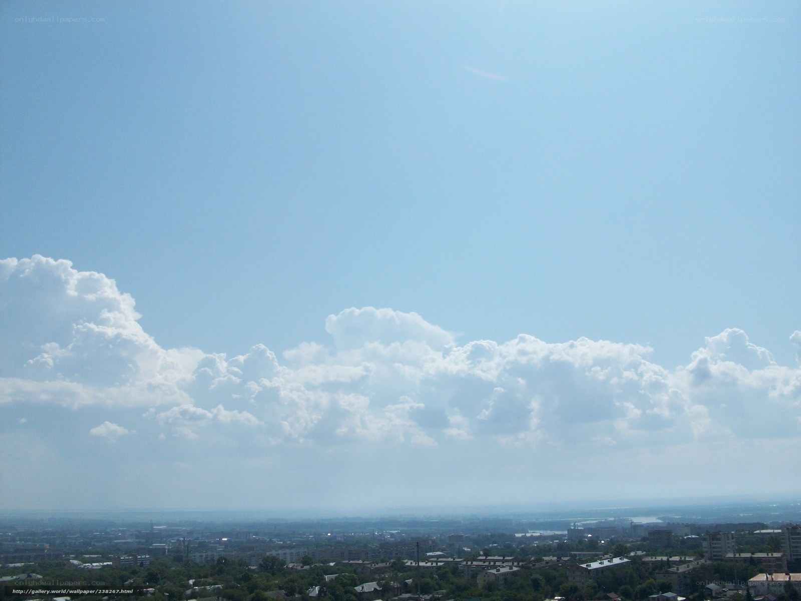 Cityscape under cloudy sky