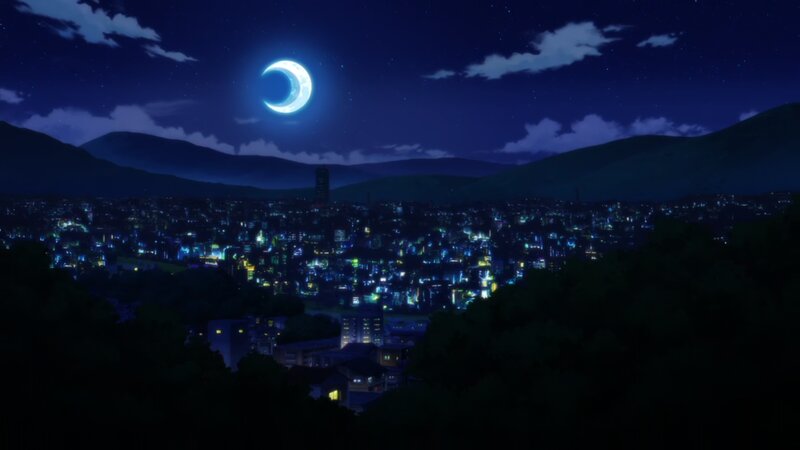 Cityscape under Crescent Moon
