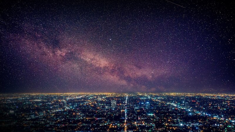 Cityscape under Milky Way