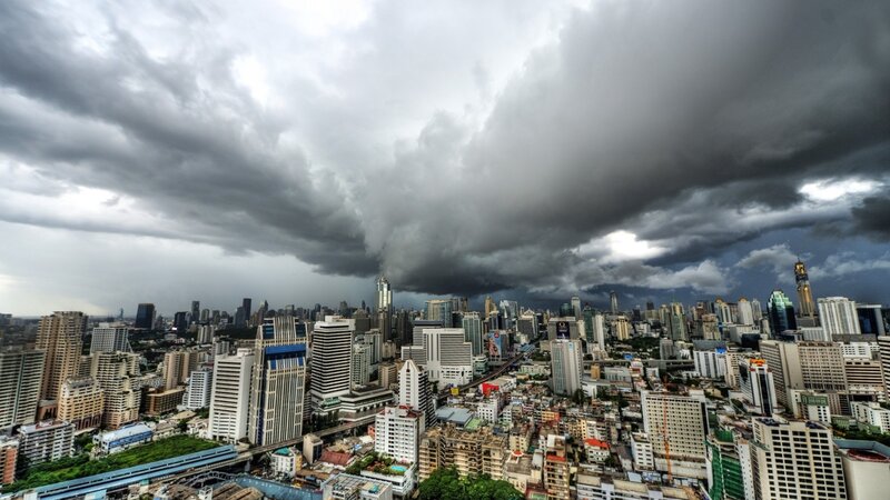 Cityscape under Storm Clouds — Gray