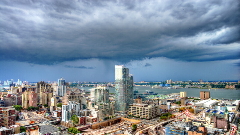 Cityscape under Storm Clouds