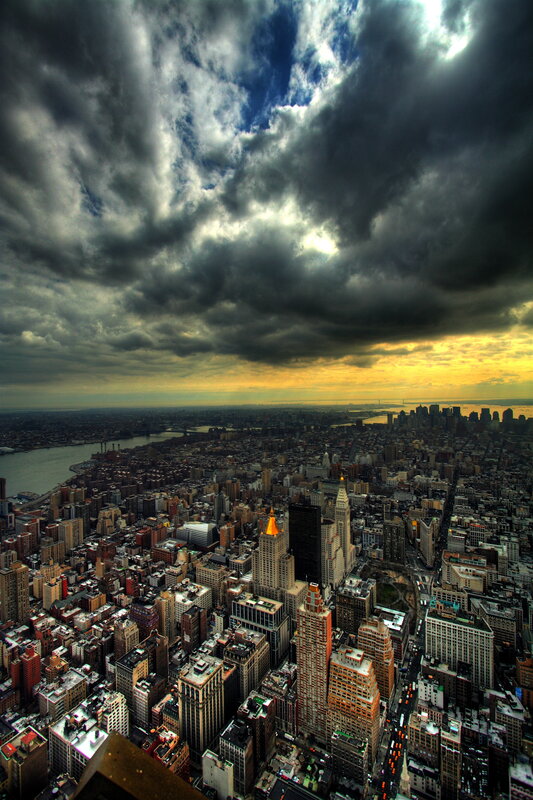 Cityscape under Stormy Sky — Gray, Dramatic, Sunset