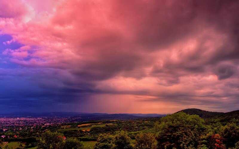 Cityscape under Stormy Sky — Pink