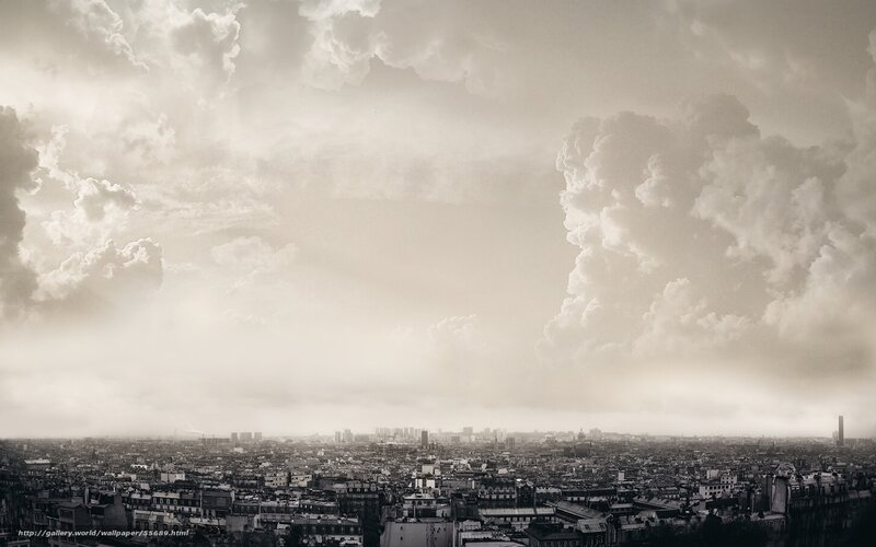 Cityscape under stormy sky