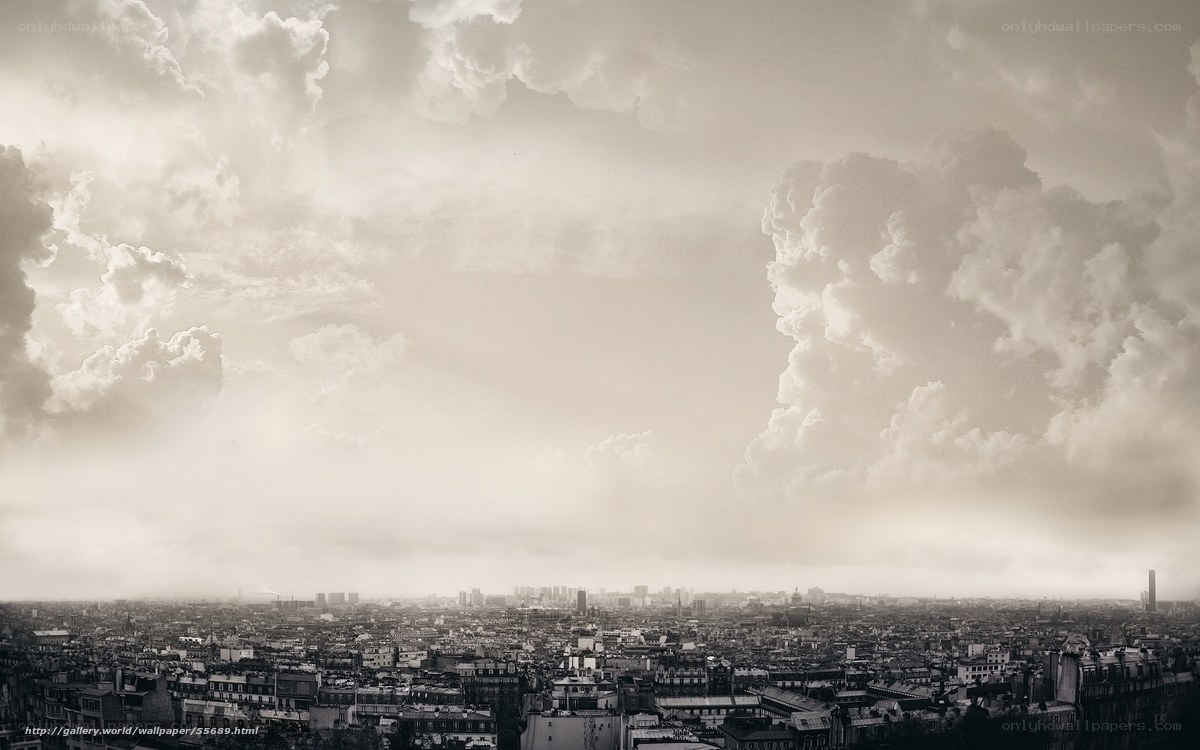 Cityscape under stormy sky