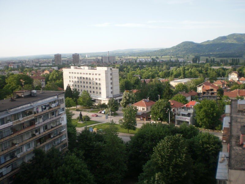 cityscape with buildings and hills