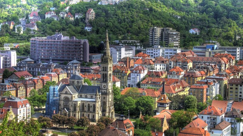 cityscape with church and hills