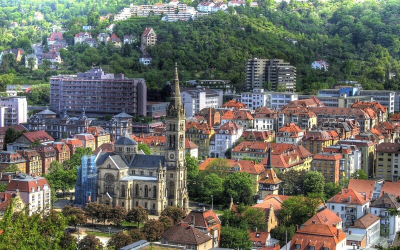 cityscape with church and hills