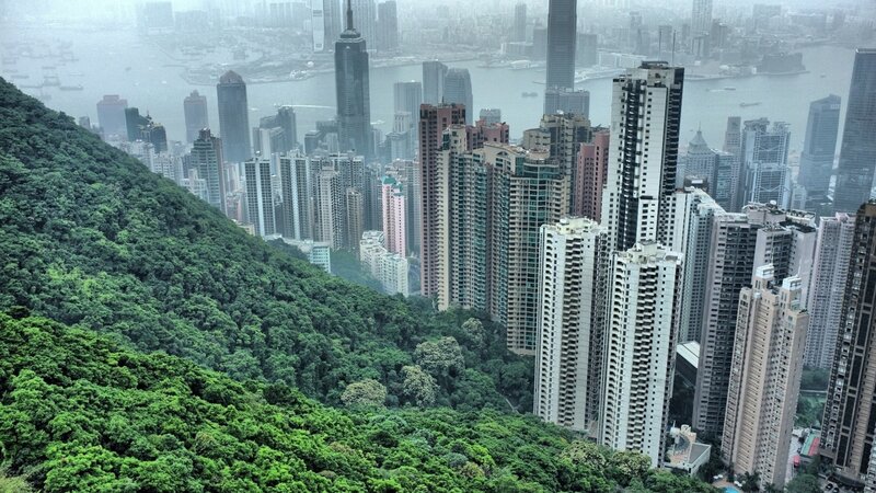 Cityscape with Green Hill