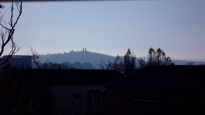 Cityscape with Hilltop Castle