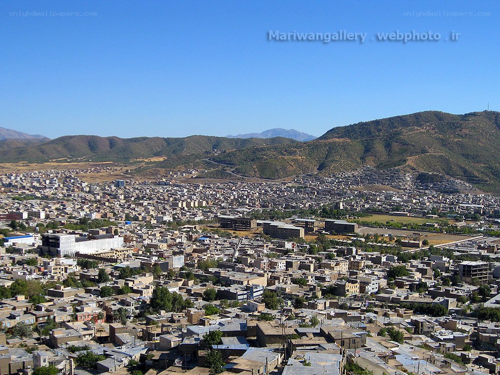 Cityscape with mountains in background
