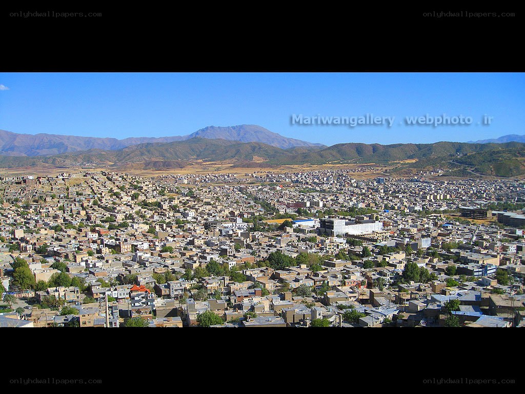 Cityscape with mountains in background