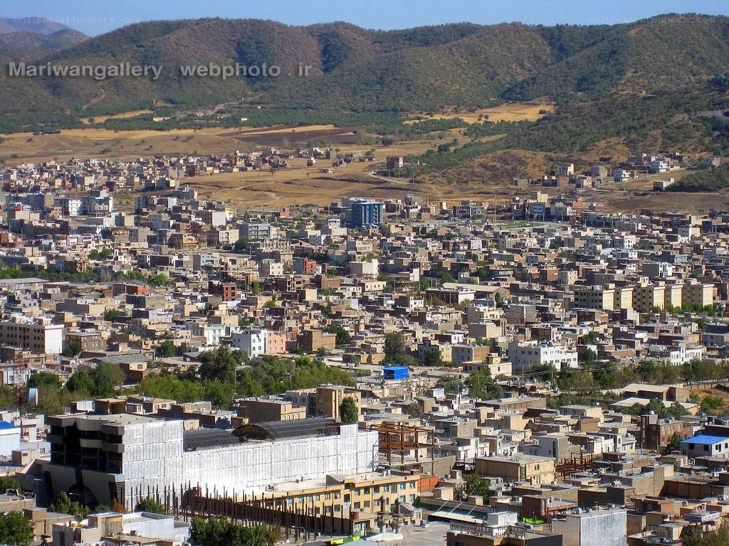 Cityscape with mountains in background