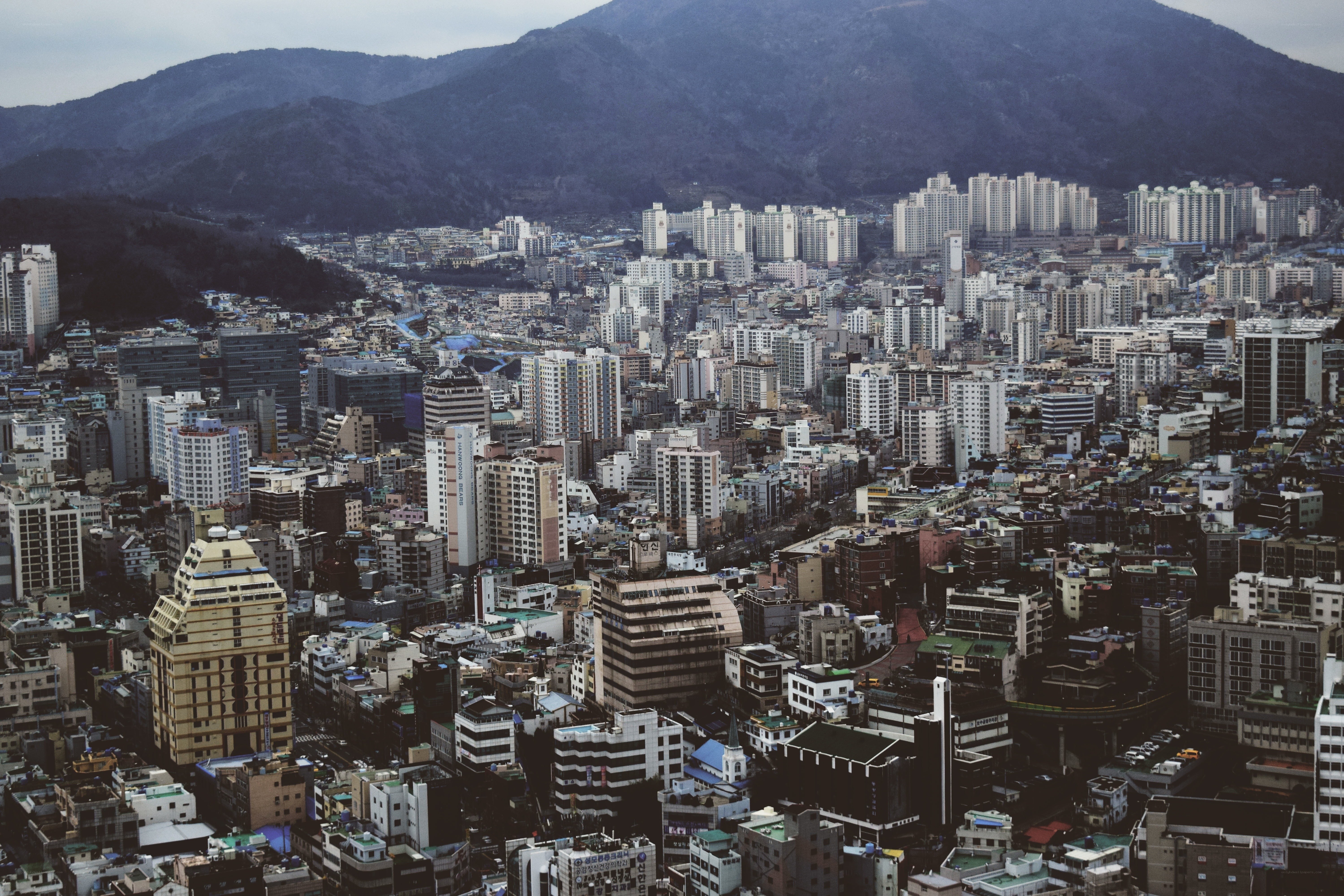 cityscape with mountains in background