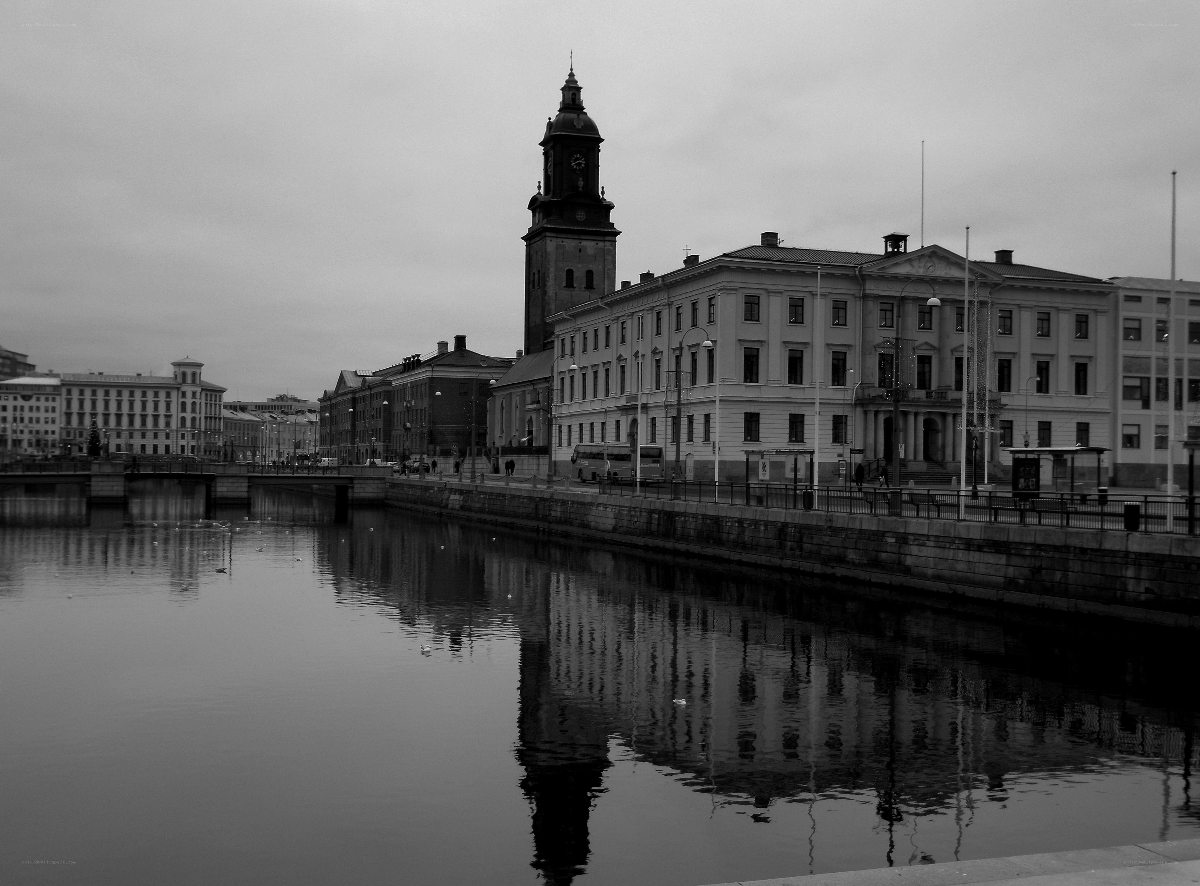Cityscape with river and clock tower