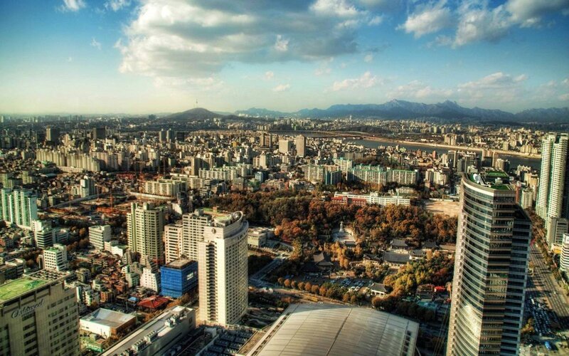 Cityscape with River and Mountains — Blue