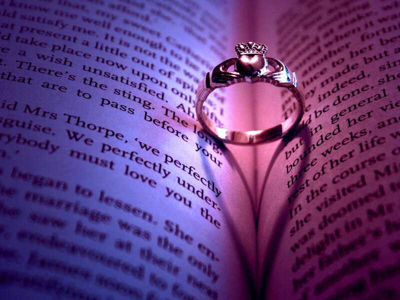 Claddagh Ring on Book — Purple