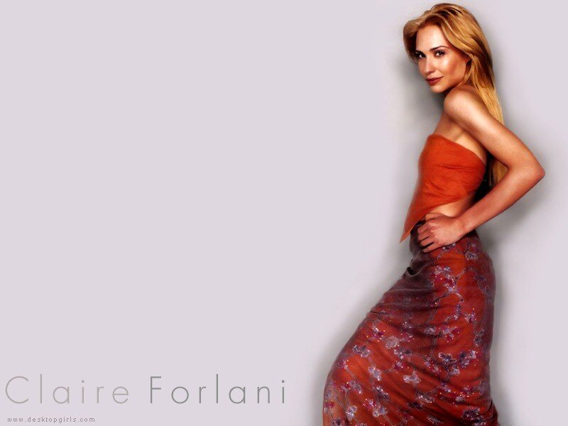 Claire Forlani in a red dress