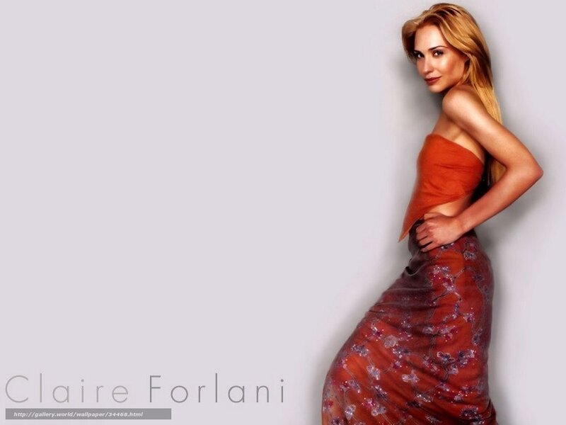 Claire Forlani in a red dress