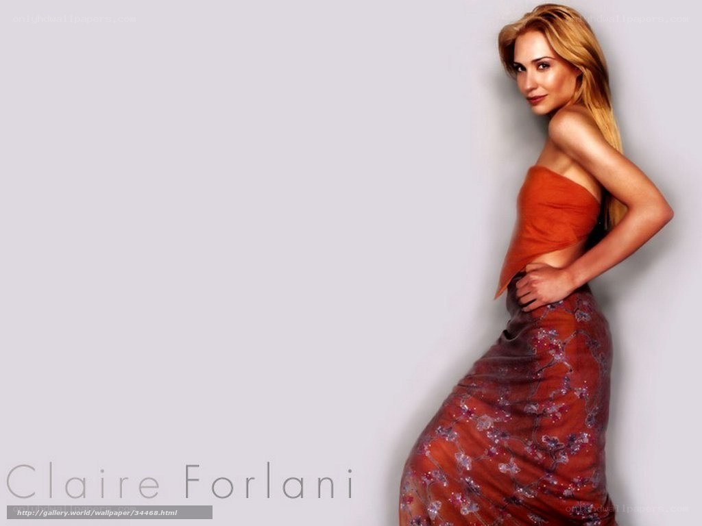 Claire Forlani in a red dress