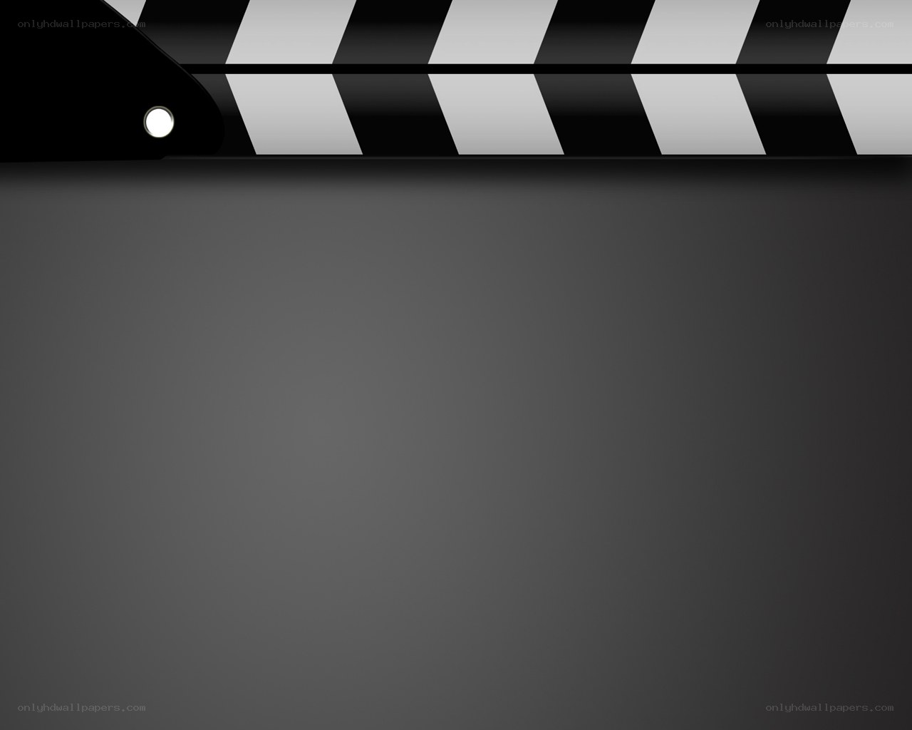 clapperboard on dark background