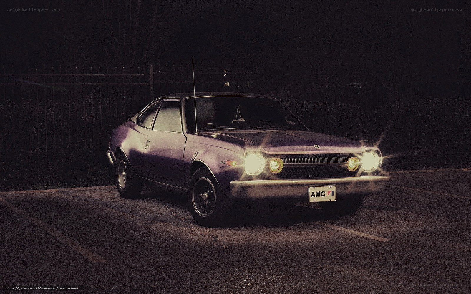 Classic AMC car at night