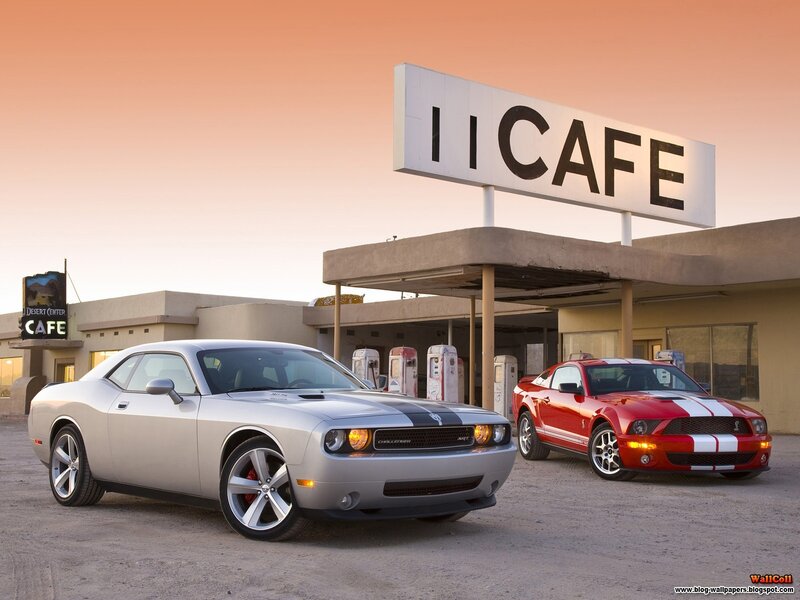 Classic American muscle cars at a desert cafe