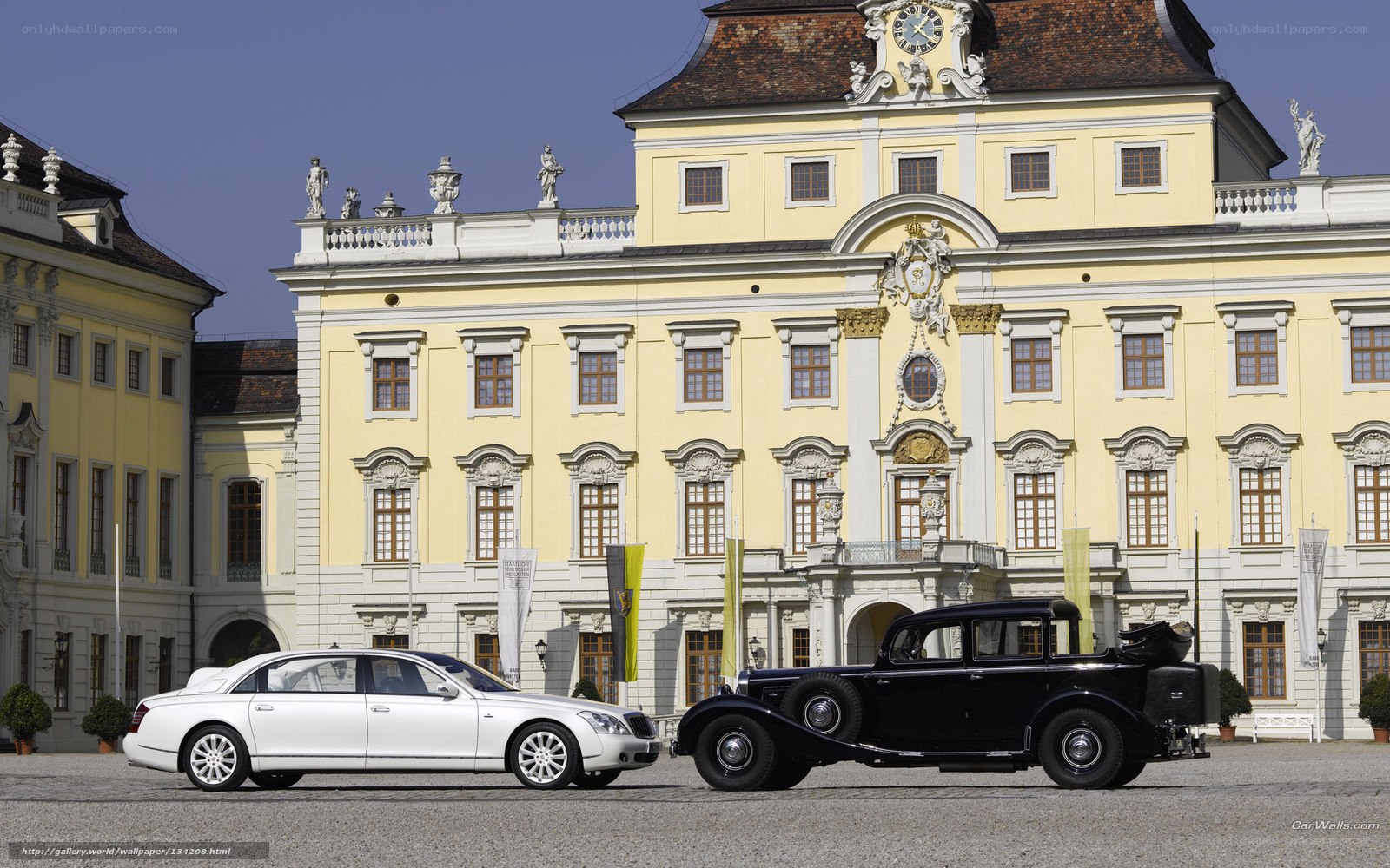 Classic and modern cars at a palace