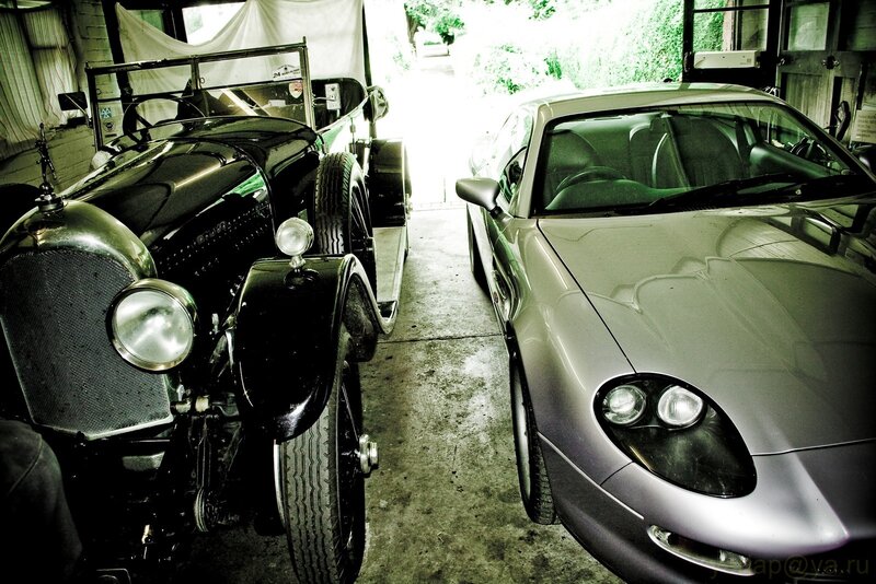 Classic and modern cars in garage